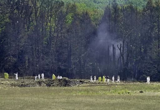 Onderzoekspersoneel op de crash site van United Airlines Flight 93, in Shanksville, Pennsylvania, 11 september 2001